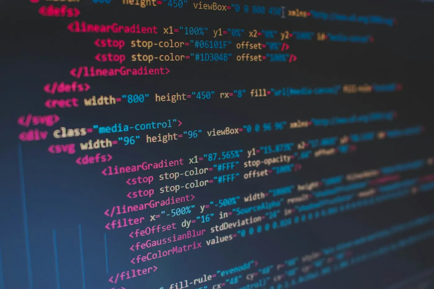 Close view of source code on a dark screen.