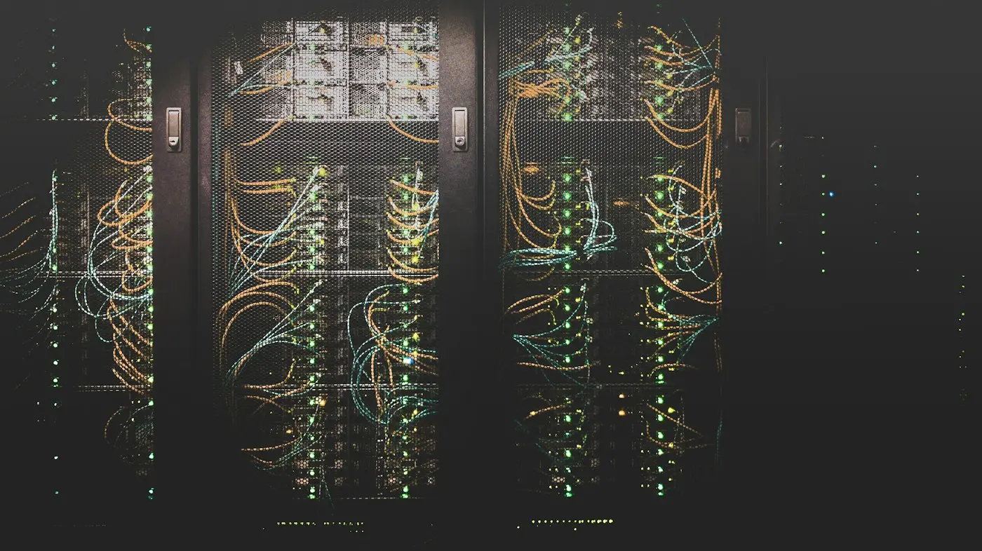 Cabled server racks in a data centre.